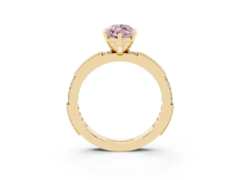 Fancy Pink Marquise Cut Diamond Solitaire Ring Set in Yellow gold with Slim Pavé Band and Prong Setting