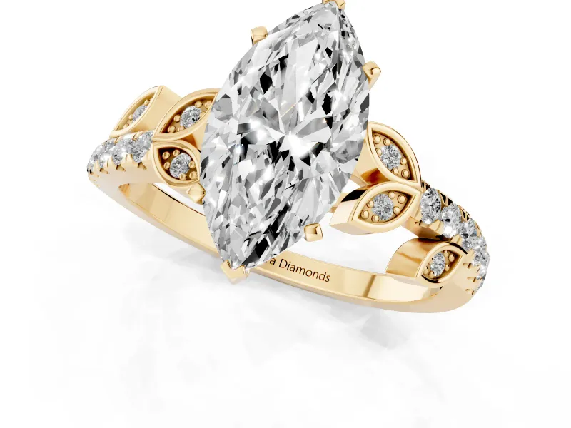 Marquise Cut Diamond Solitaire Leaf-Inspired Ring Set in Yellow gold with Pavé Band and Prong Setting
