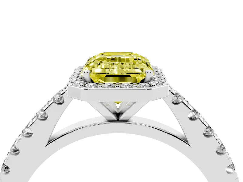 Fancy Yellow Emerald Cut Diamond Halo Engagement Ring Set in Platinum with Pavé Band and Prong Setting