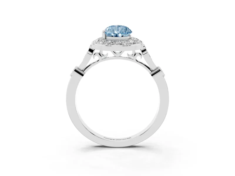 Fancy Blue Pear Cut Diamond Halo Engagement Ring Set in White gold with Twisted Band and Prong Setting