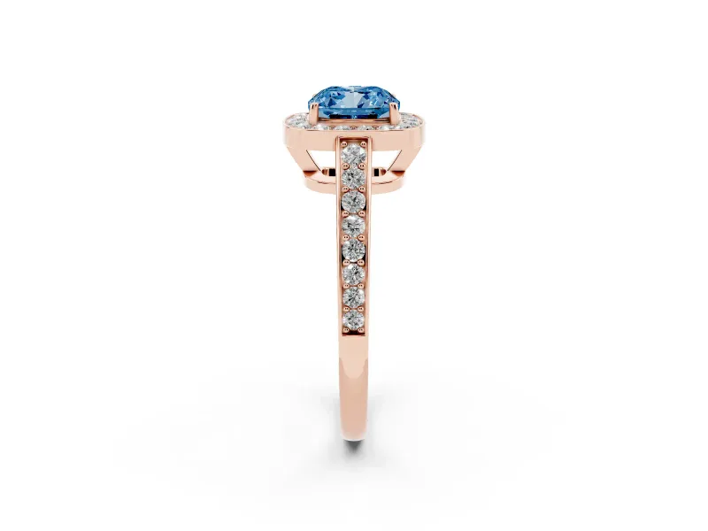 Fancy Blue Cushion Cut Diamond Halo Pavé Engagement Ring Set in Rose gold with Bezel Setting