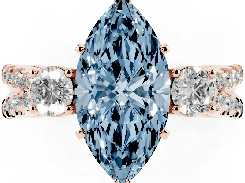 Fancy Blue Marquise Cut Diamond Three-Stone Ring Set in Rose gold with Pavé Split Shank and Prong Setting