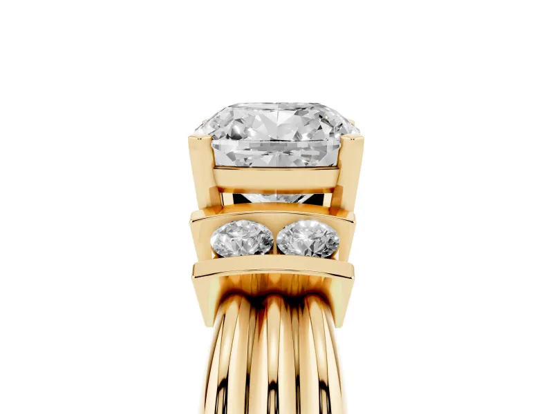 Three-Stone Cushion Cut Diamond Channel Set Ring Set in Yellow gold with Bar Prongs