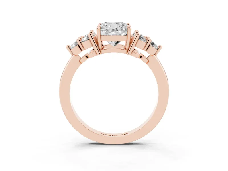 Cushion Cut Diamond Solitaire Ring Set in Rose gold with Cluster Accents on Each Side