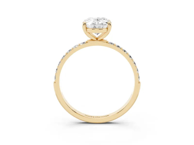 Oval Cut Diamond Solitaire Ring Set in Yellow gold with Round Pavé Band and Prong Setting