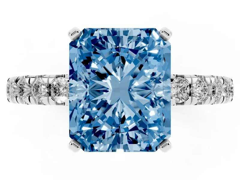 Fancy Blue Radiant Cut Diamond Pavé Solitaire Ring Set in White gold with Round Band and Prong Setting