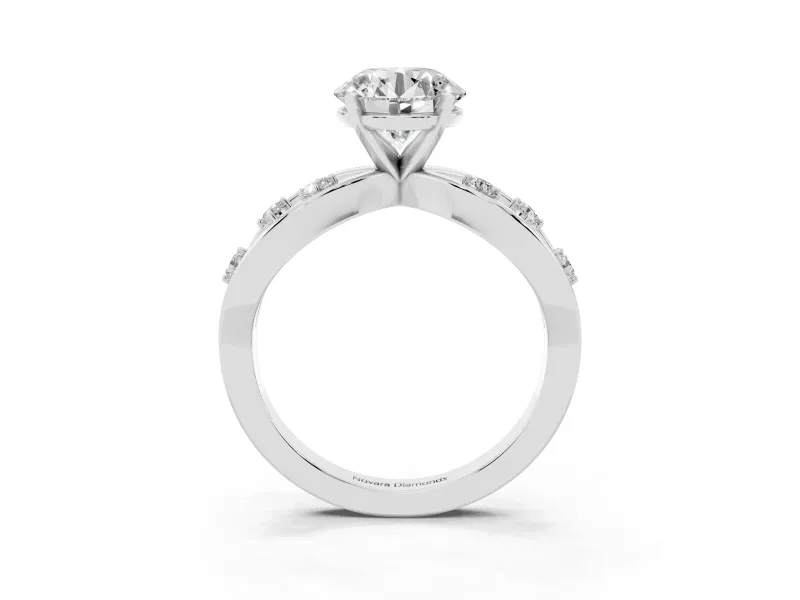 Round Cut Diamond Solitaire Ring Set in Platinum with Side Stones on Criss-Cross Band and Prong Setting