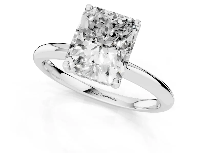 Radiant Cut Diamond Solitaire Engagement Ring Set in Platinum with Prong Setting and Polished Band