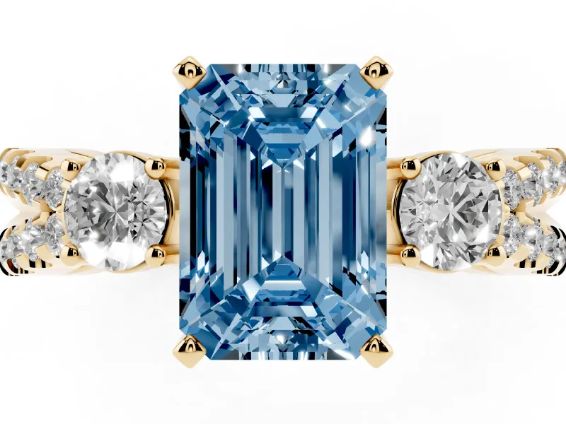 Emerald Cut Three Stone Engagement Ring Setting for a Fancy Blue Lab-Grown Diamond | Yellow Gold
