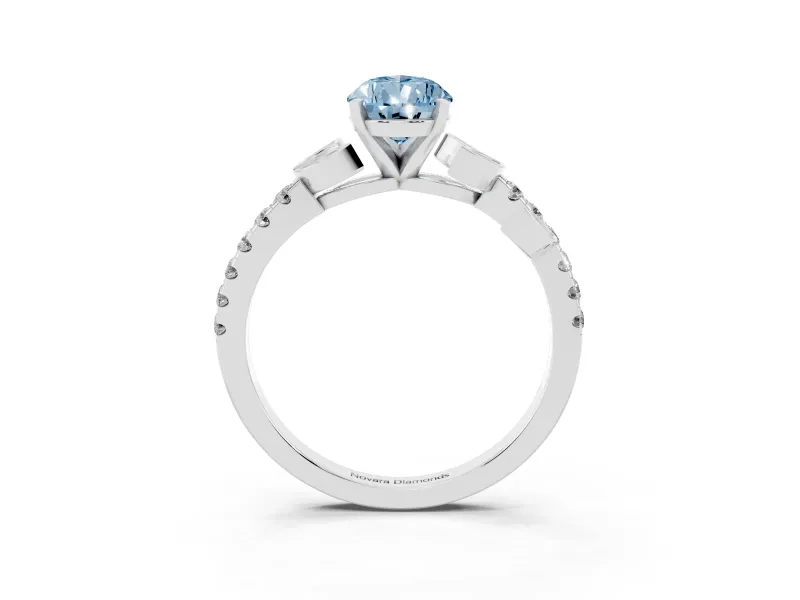 Fancy Blue Pear Cut Diamond Solitaire Leaf-Inspired Ring Set in Platinum with Pavé Band and Prong Setting