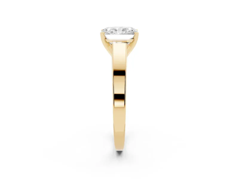 Radiant Cut Diamond Solitaire Engagement Ring Set in Yellow gold with Prong Setting and Tapered Band