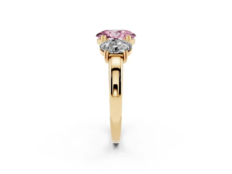 Fancy Pink Oval Cut Diamond Three-Stone Ring Set in Yellow gold with Polished Band and Prong Setting
