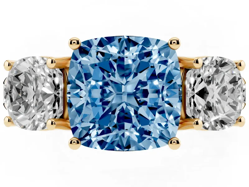 Fancy Blue Cushion Cut Diamond Three-Stone Ring Set in Yellow gold with Pavé Band
