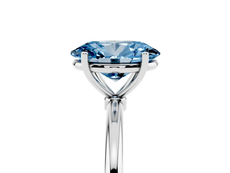 Fancy Blue Oval Cut Diamond Solitaire Engagement Ring Set in Silver with Thin Band and Prong Setting