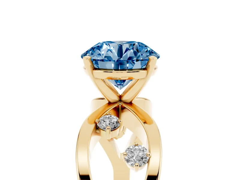 Fancy Blue Round Cut Diamond Solitaire Ring Set in Yellow gold with Side Stones on Criss-Cross Band and Prong Setting