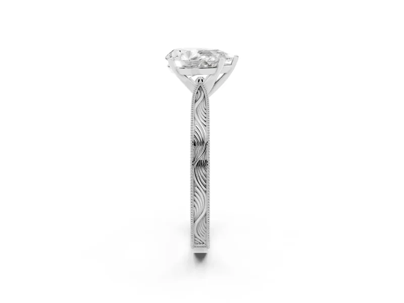 Pear Cut Diamond Solitaire Milgrain Engraved Band Set in White gold with Prong Setting