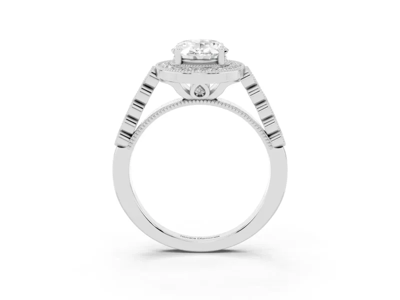 Oval Cut Diamond Milgrain Halo Solitaire Ring Set in Platinum with Bezel Set Side Stones and Pavé Band