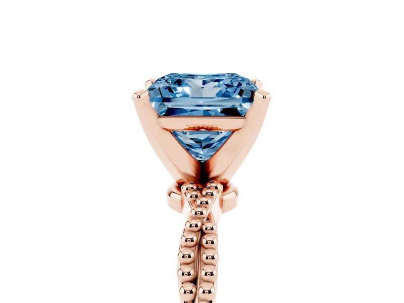 Fancy Blue Princess Cut Diamond Solitaire Ring Set in Rose gold with Twisted Band and Bead Prong Setting