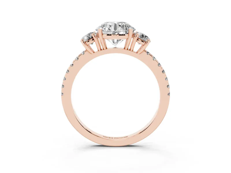 Round Cut Diamond Three-Stone Ring Set in Rose gold with Pavé Band and Graduated Sides