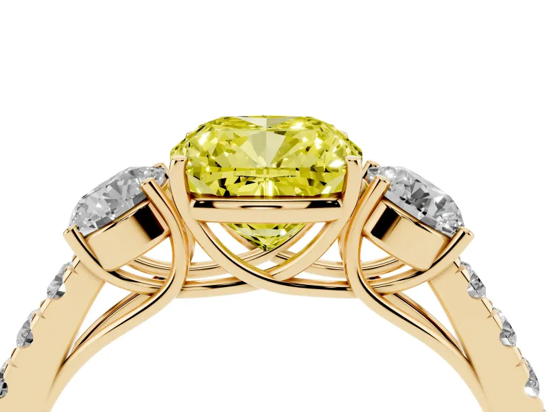 Fancy Yellow Cushion Cut Diamond Three-Stone Ring Set in Yellow gold with Round Side Stones and Delicate Pavé Band