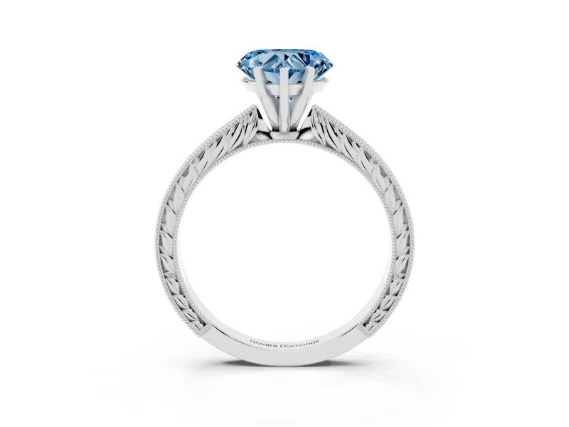 Fancy Blue Heart Cut Diamond Solitaire Milgrain Engraved Band Set in White gold with Prong Setting