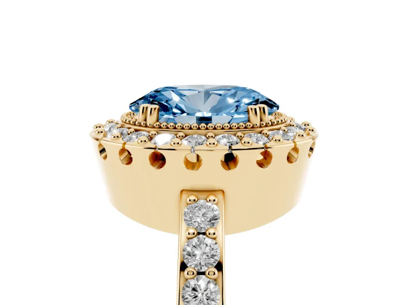 Fancy Blue Oval Cut Diamond Halo Ring Set in Yellow gold with Pavé Shank and Prong Setting