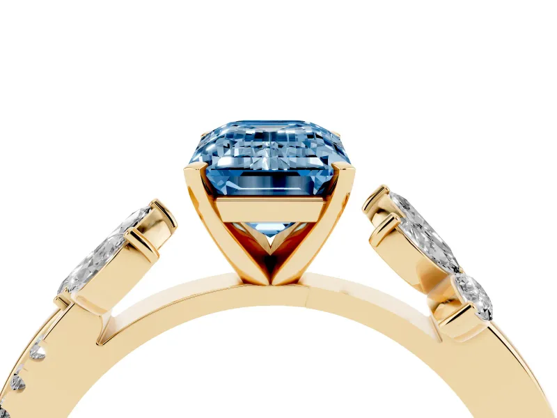 Fancy Blue Emerald Cut Diamond Floral Vine Solitaire Engagement Ring Set in Yellow gold with Marquise Leaves