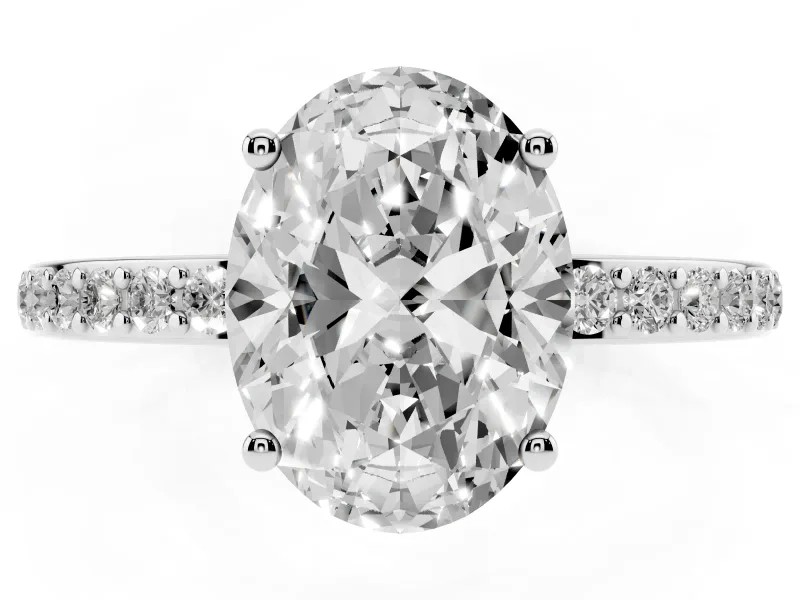 Oval Cut Diamond Pavé Band Ring Set in Platinum with Prong-Set Center Stone