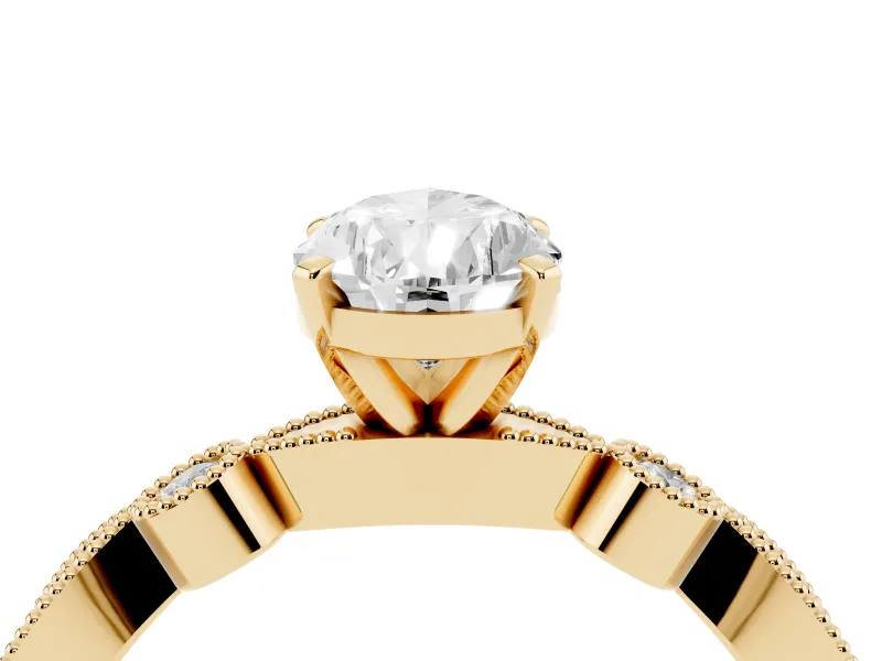 Pear Cut Diamond Solitaire Engagement Ring Set in Yellow gold with Milgrain Bezel Accent Band