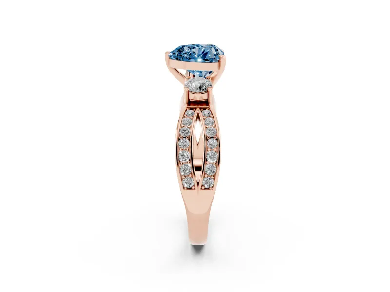 Heart-Shaped Three-Stone Pavé Twist Engagement Ring Setting for a Fancy Blue Lab-Grown Diamond | Split Shank | Rose Gold