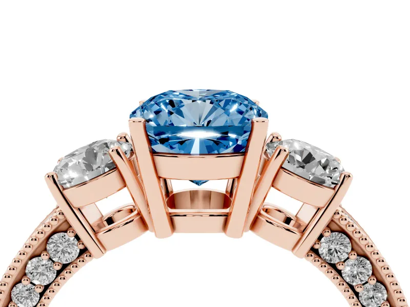 Fancy Blue Cushion Cut Diamond Three-Stone Ring Set in Rose gold with Round Side Stones and Pavé Band