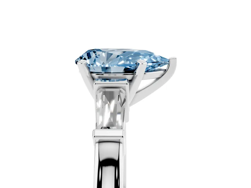 Fancy Blue Pear Cut Diamond Solitaire Ring Set in Silver with Tapered Baguette Accents and Prong Setting
