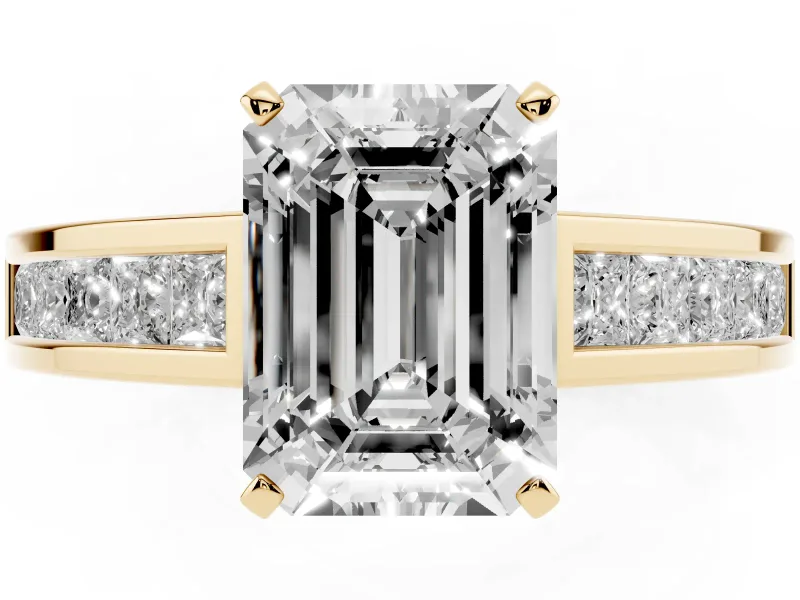 Emerald Cut Diamond Solitaire Ring Set in Yellow gold with Channel-Set Band and Prong Setting