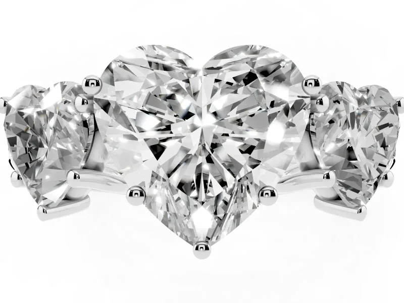 Heart Cut Diamond Three-Stone Ring Set in Platinum with Pavé Band
