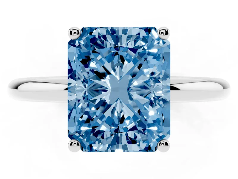Fancy Blue Radiant Cut Diamond Solitaire Engagement Ring Set in Silver with Prong Setting and Polished Band