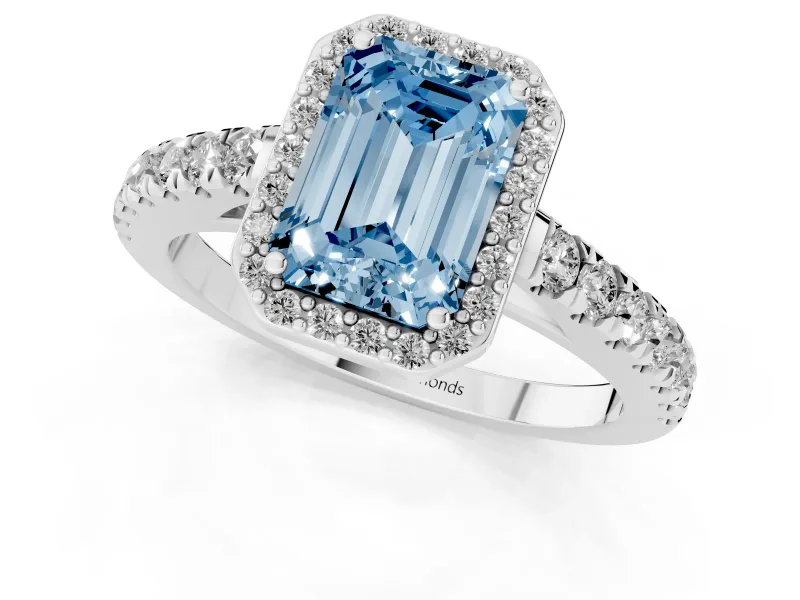 Fancy Blue Emerald Cut Diamond Halo Engagement Ring Set in White gold with Pavé Band and Prong Setting