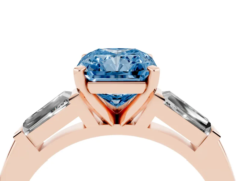 Fancy Blue Radiant Cut Diamond Solitaire Ring Set in Rose gold with Tapered Baguette Side Stones and Prong Setting
