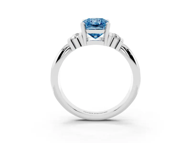 Fancy Blue Three-Stone Radiant Cut Diamond Channel Set Ring Set in White gold with Bar Prongs