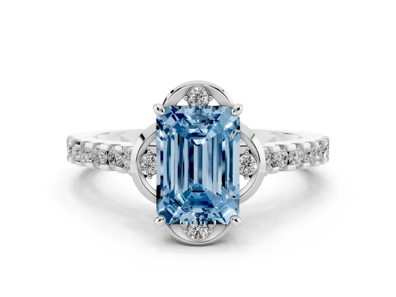 Fancy Blue Emerald Cut Diamond Solitaire Ring Set in White gold with Pavé Band and Floral Prong Setting