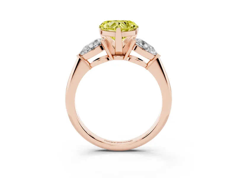 Fancy Yellow Three-Stone Heart Cut Diamond Ring Set in Rose gold with Pear Side Stones and Prong Setting