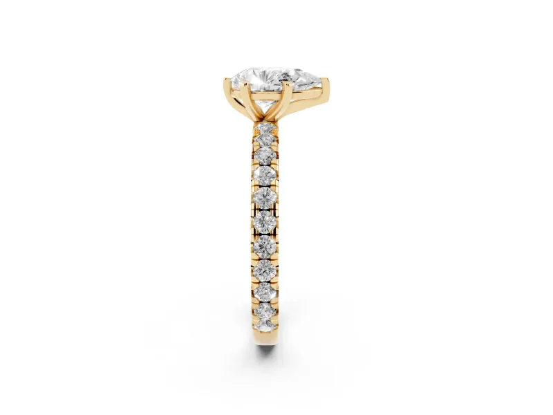 Pear Cut Diamond Pavé Solitaire Ring Set in Yellow gold with Round Band and Prong Setting