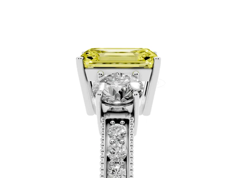 Emerald Cut Three Stone Engagement Ring Setting for a Fancy Yellow Lab-Grown Diamond | Graduated Pave Band | Platinum