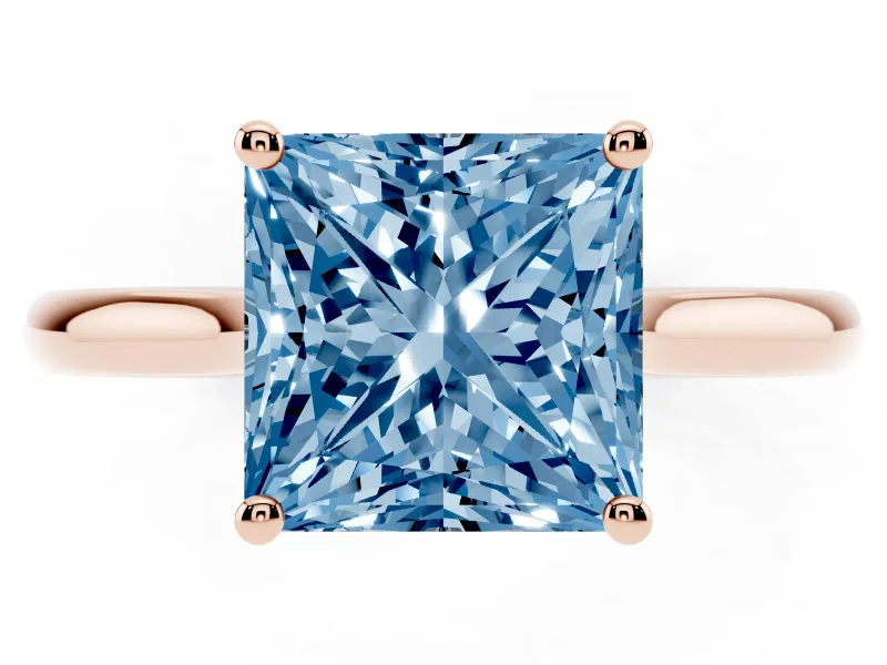 Fancy Blue Princess Cut Diamond Solitaire Ring Set in Rose gold with Cathedral Band and Prong Setting