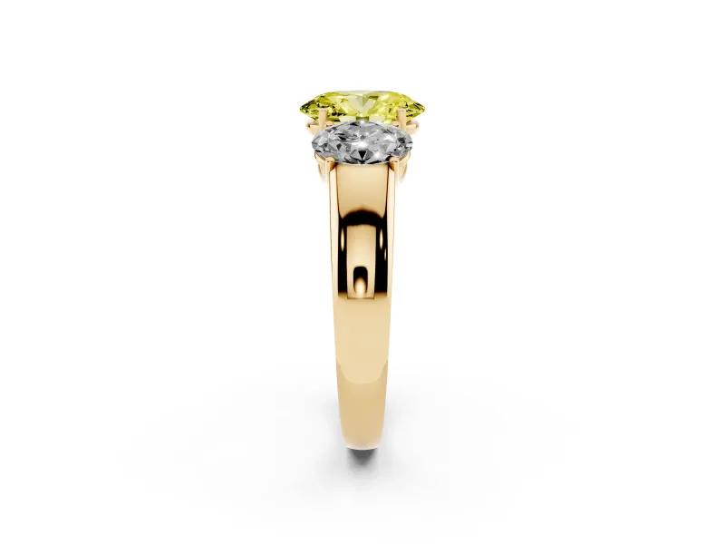 Fancy Yellow Three-Stone Oval Cut Diamond Ring Set in Yellow gold with Matching Prong Settings and Plain Band