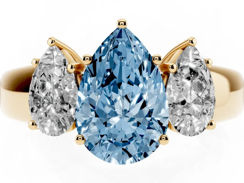 Fancy Blue Three-Stone Pear Cut Diamond Ring Set in Yellow gold with Matching Prong Settings and Plain Band
