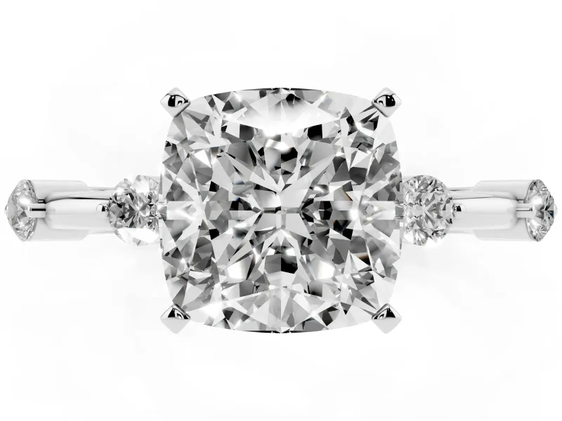 Cushion Cut Diamond Solitaire Ring Set in White gold with Bezel Set Side Stones and Prong Setting