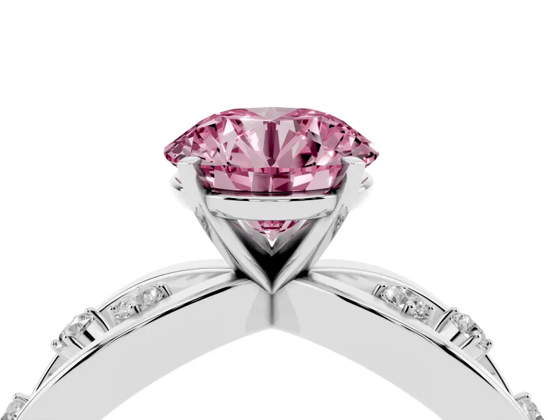 Fancy Pink Round Cut Diamond Solitaire Ring Set in Platinum with Side Stones on Criss-Cross Band and Prong Setting