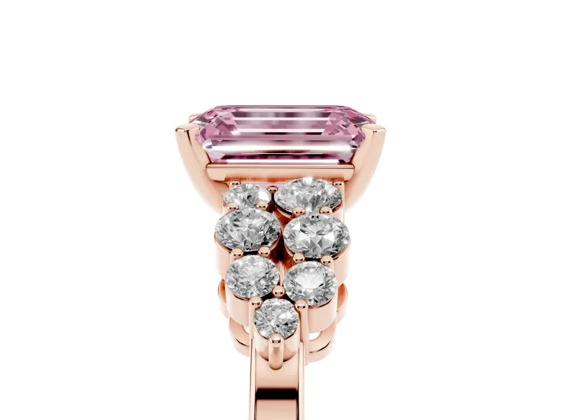 Fancy Pink Emerald Cut Diamond Cluster Engagement Ring Set in Rose gold with Pavé Band and Prong Setting