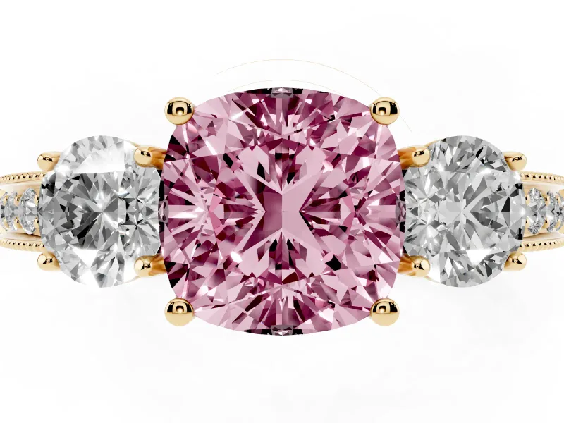 Fancy Pink Cushion Cut Diamond Three-Stone Ring Set in Yellow gold with Round Side Stones and Pavé Band