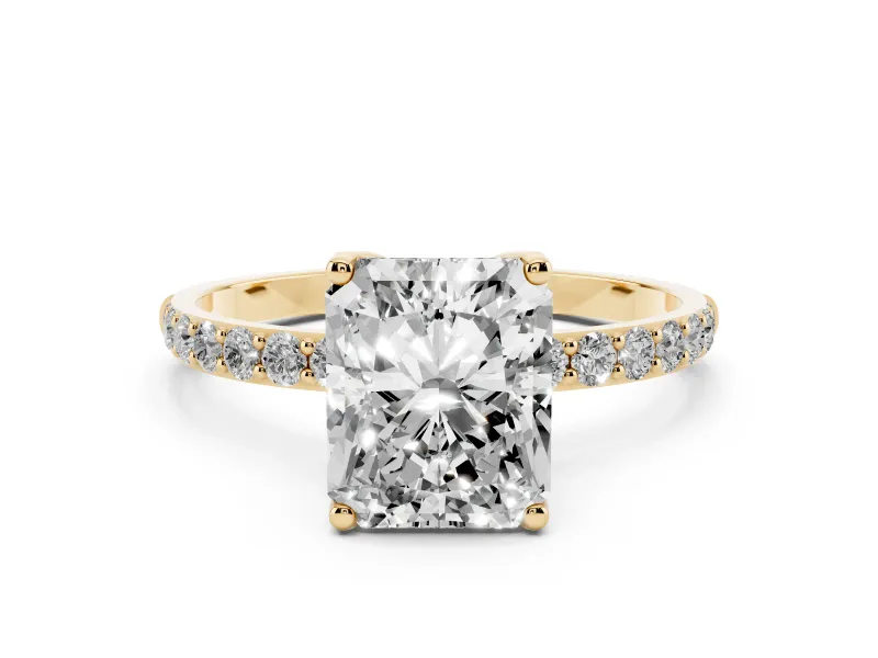 Radiant Cut Diamond Solitaire Engagement Ring Set in Yellow gold with Round Pavé Band and Prong Setting